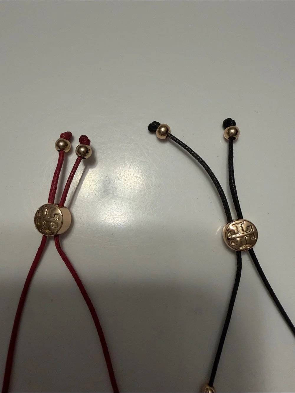 TWO Tory Burch Adjustable Beaded BraceletS - Red and Black